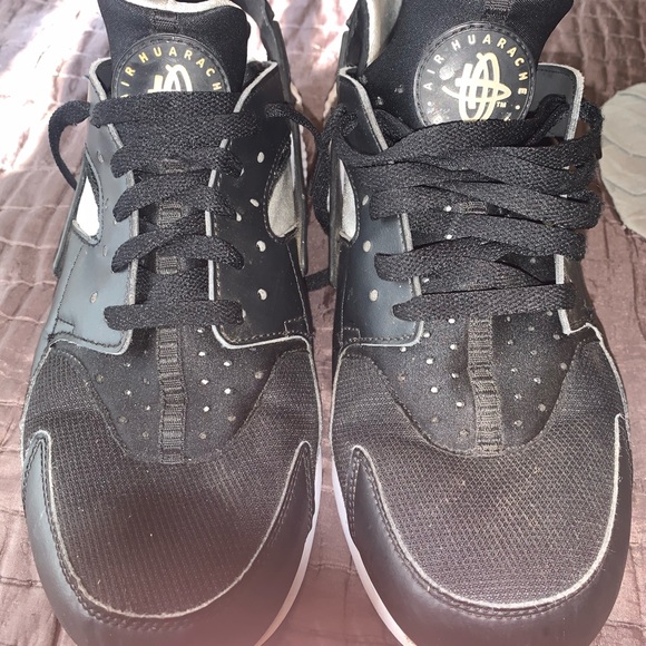 black huaraches with white bottom